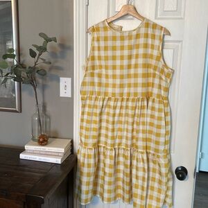 Medium knee length gingham yellow dress with pockets